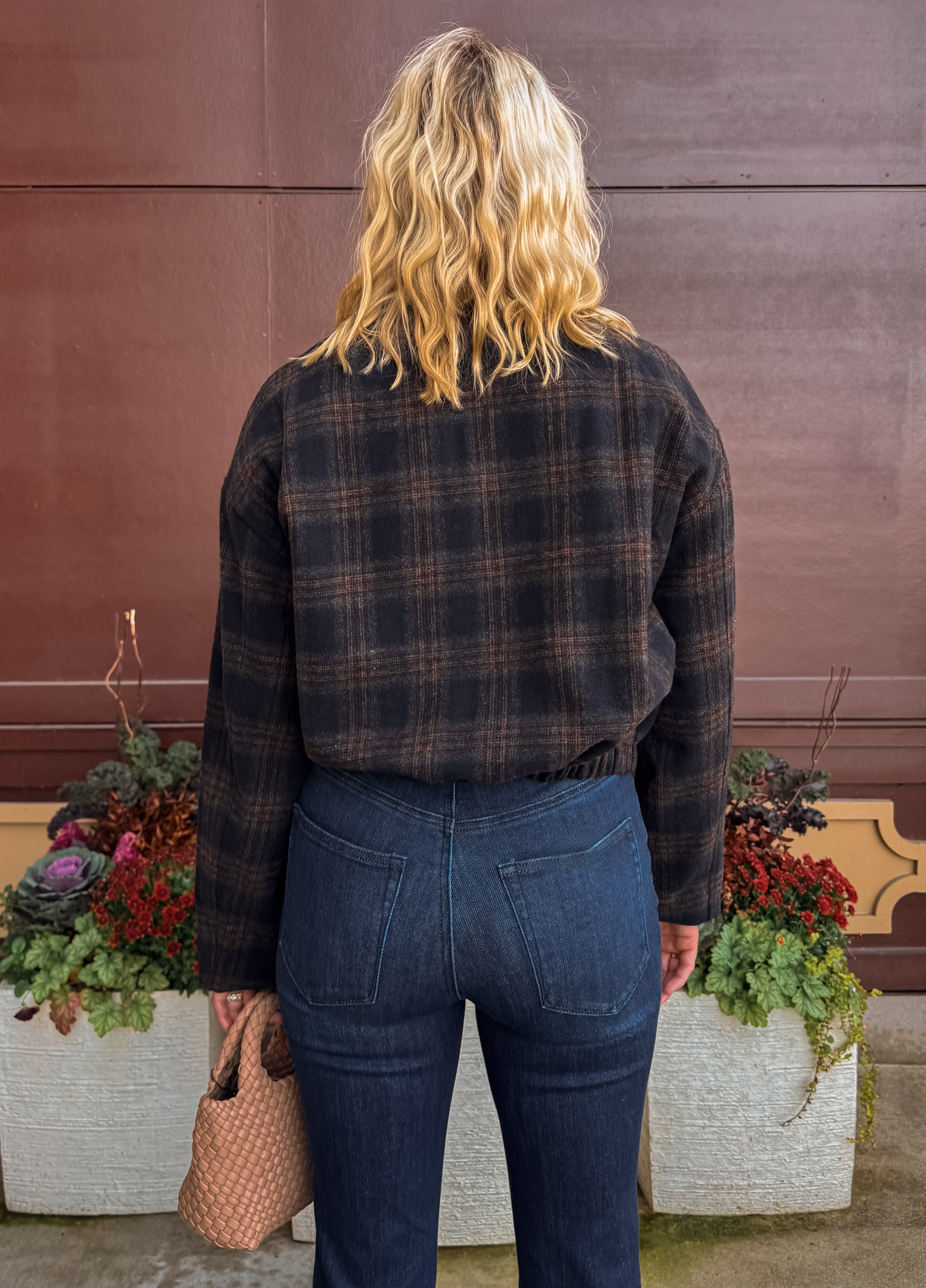 Zoe & Claire Darcy Plaid Jacket in black and brown plaid, back view.