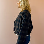 Zoe & Claire Darcy Plaid Jacket in black and brown plaid, side view.