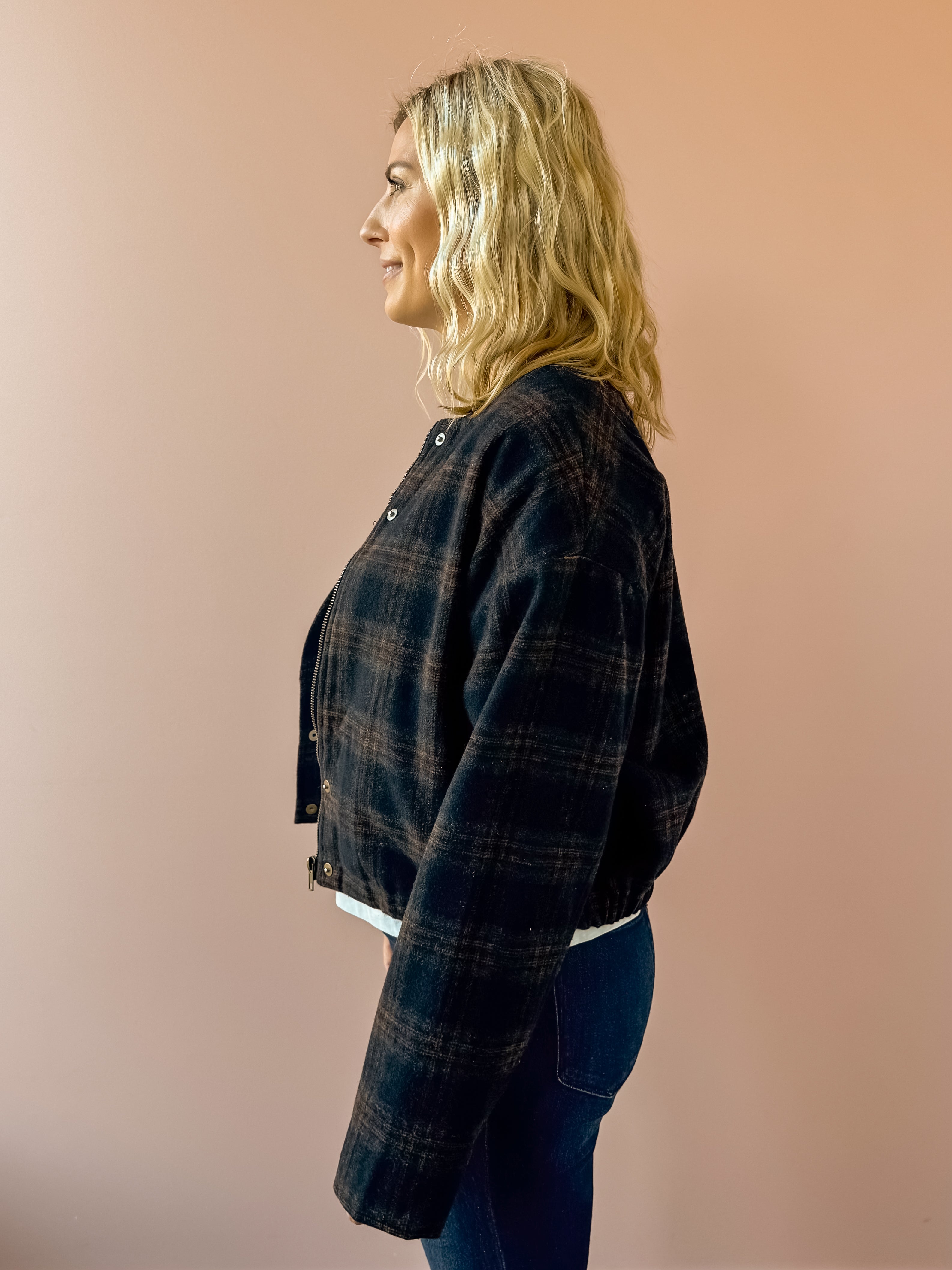 Zoe & Claire Darcy Plaid Jacket in black and brown plaid, side view.