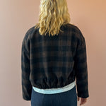 Zoe & Claire Darcy Plaid Jacket in black and brown plaid, back view.