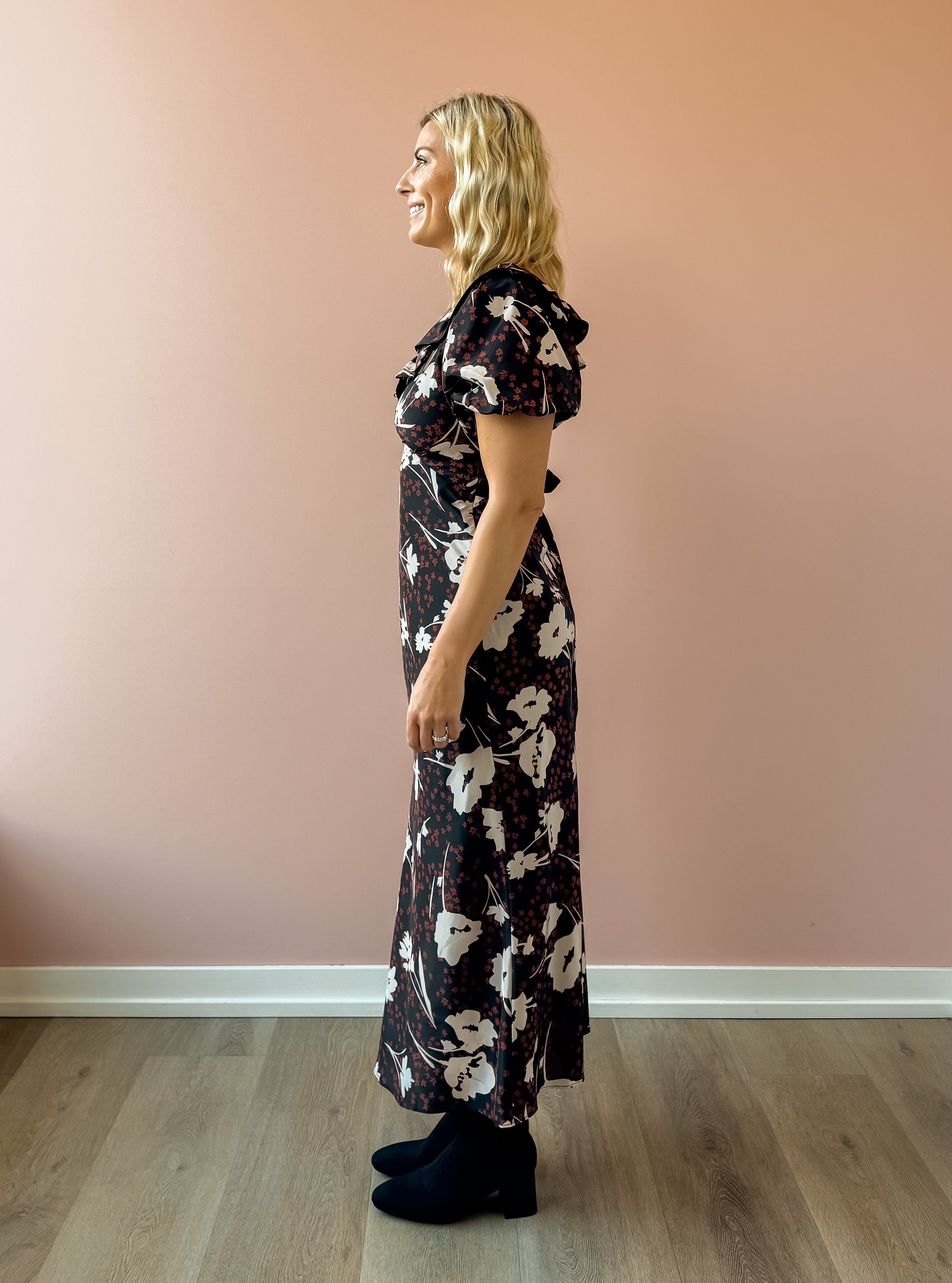 Heartloom Vivan Midi Dress in black floral, side view.