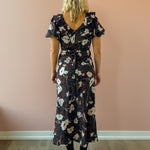 Heartloom Vivan Midi Dress in black floral, back view.