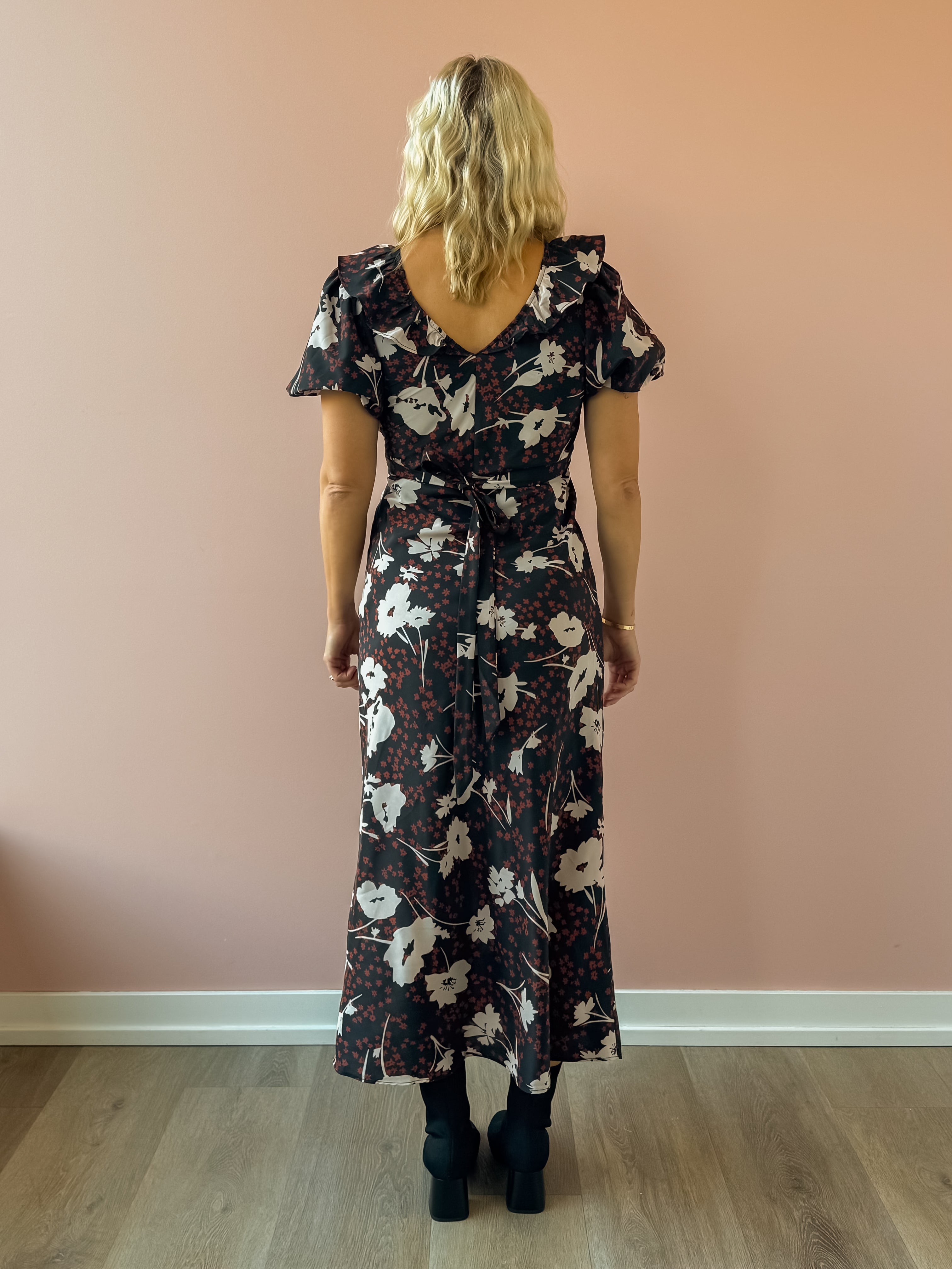 Heartloom Vivan Midi Dress in black floral, back view.