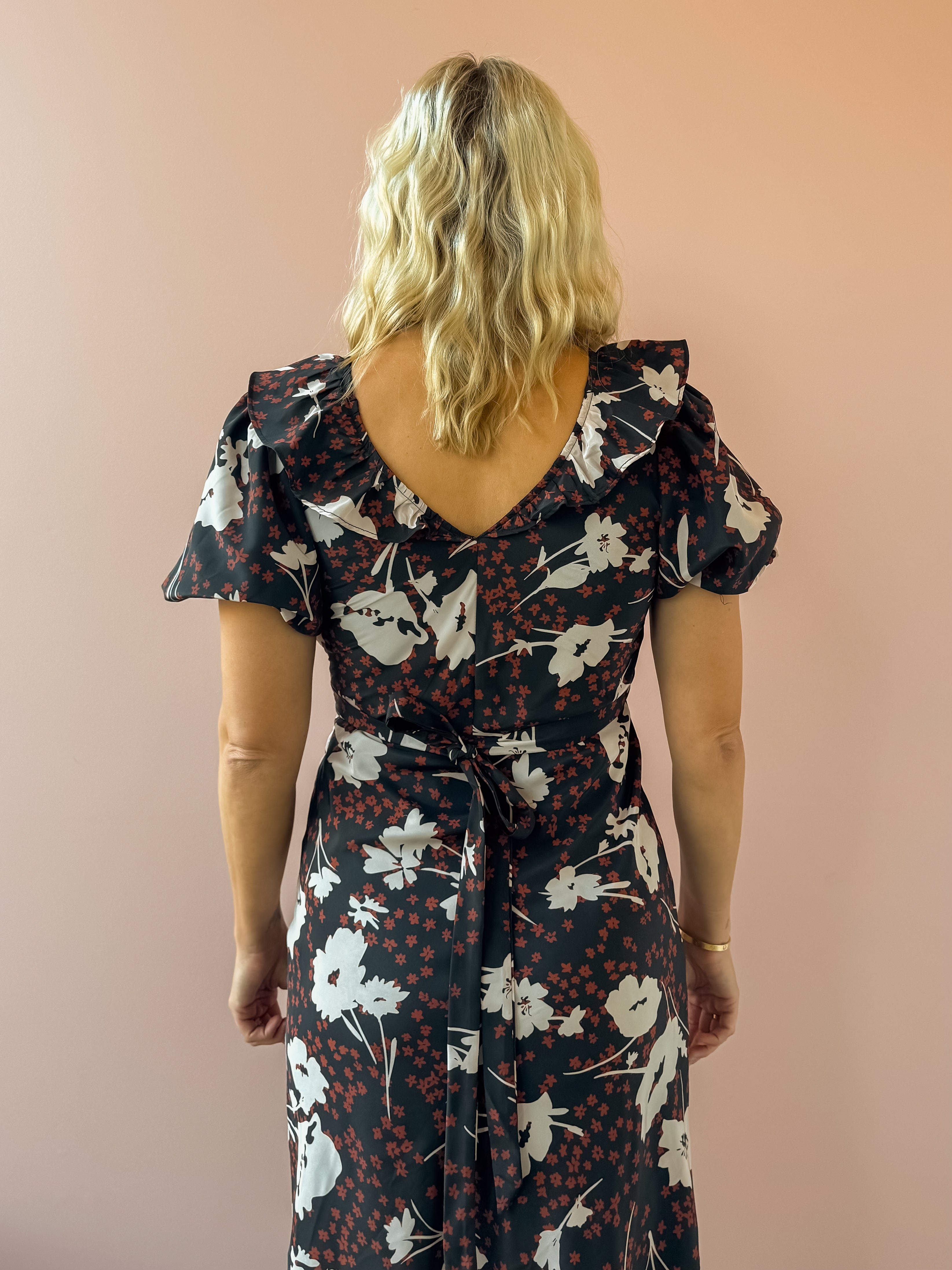 Heartloom Vivan Midi Dress in black floral, close-up back view.