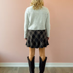 Z Supply Bellissimo Plaid Mini Skirt in brown plaid, back view.