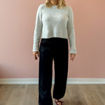 Olivaceous Jodi Satin Pants in black, front view.
