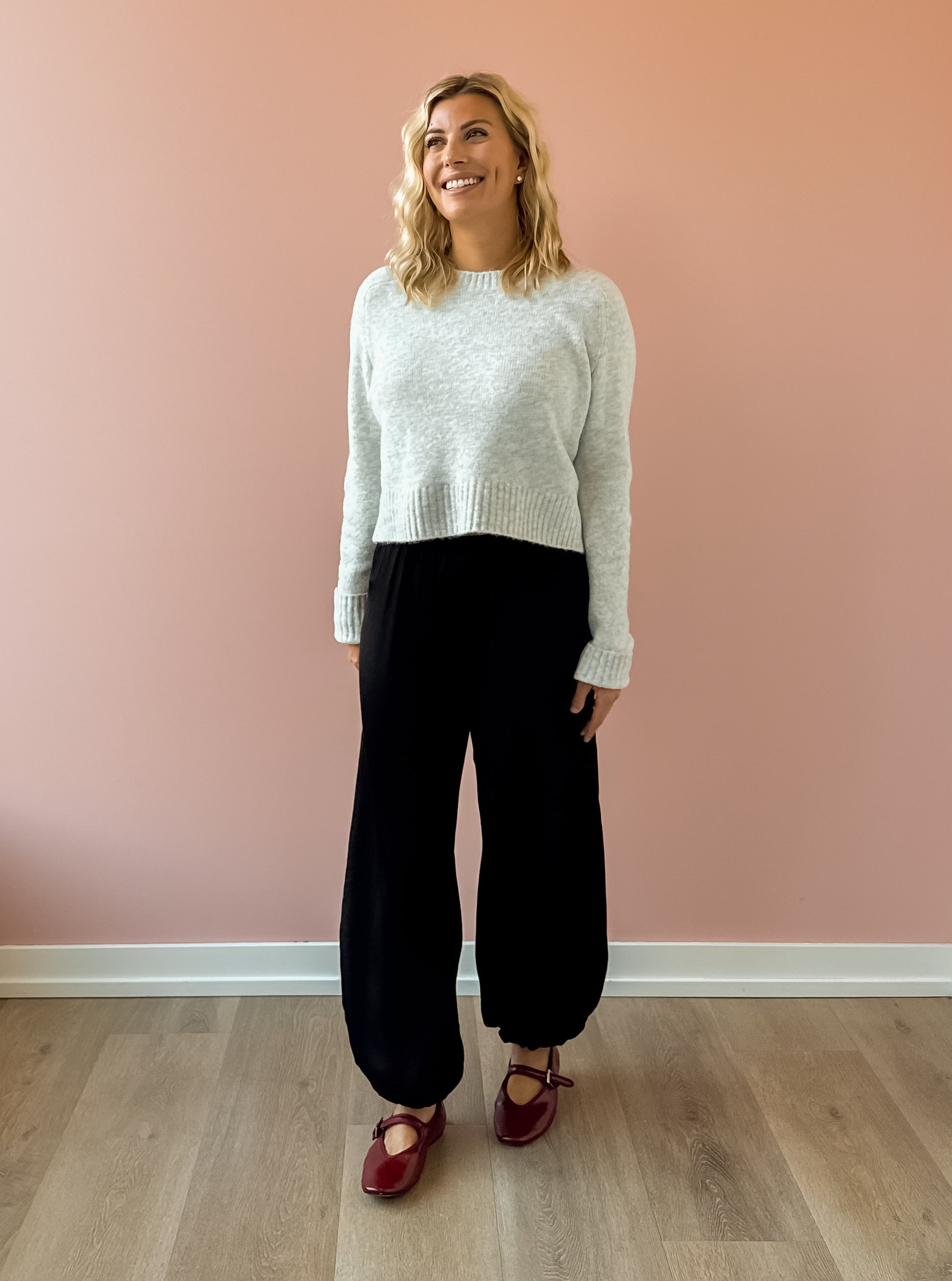 Olivaceous Jodi Satin Pants in black, front view.