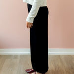 Olivaceous Jodi Satin Pants in black, side view.