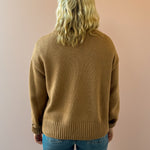 Z Supply Cloud Spun V-neck Sweater in beige, back view.