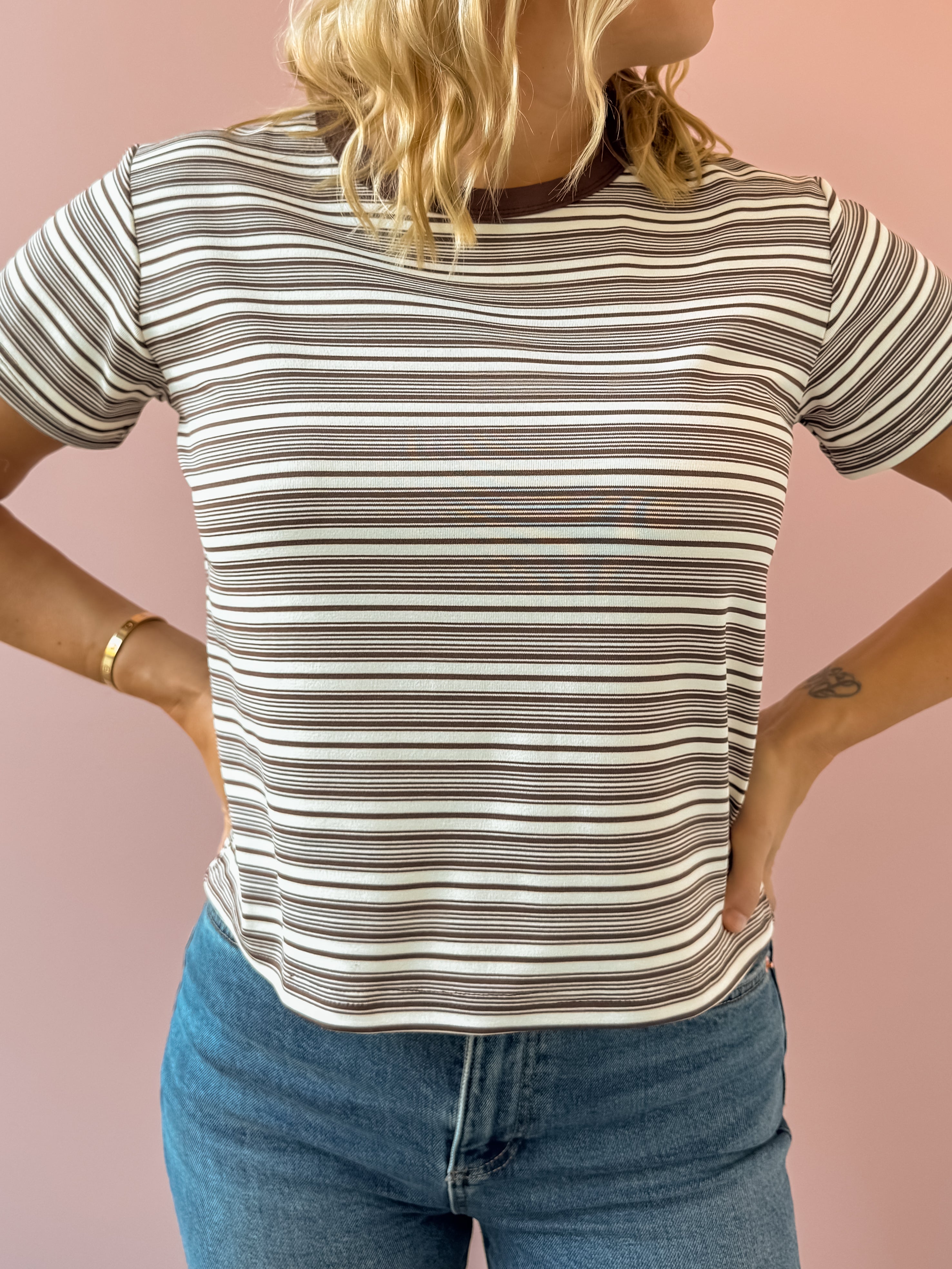 Olivaceous Mila Stripe Baby Tee in brown and white stripe, close-up detail.