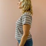 Olivaceous Mila Stripe Baby Tee in brown and white stripe, side view.