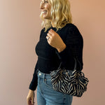 Z Supply Avery Black Sweater Top in black, side view.
