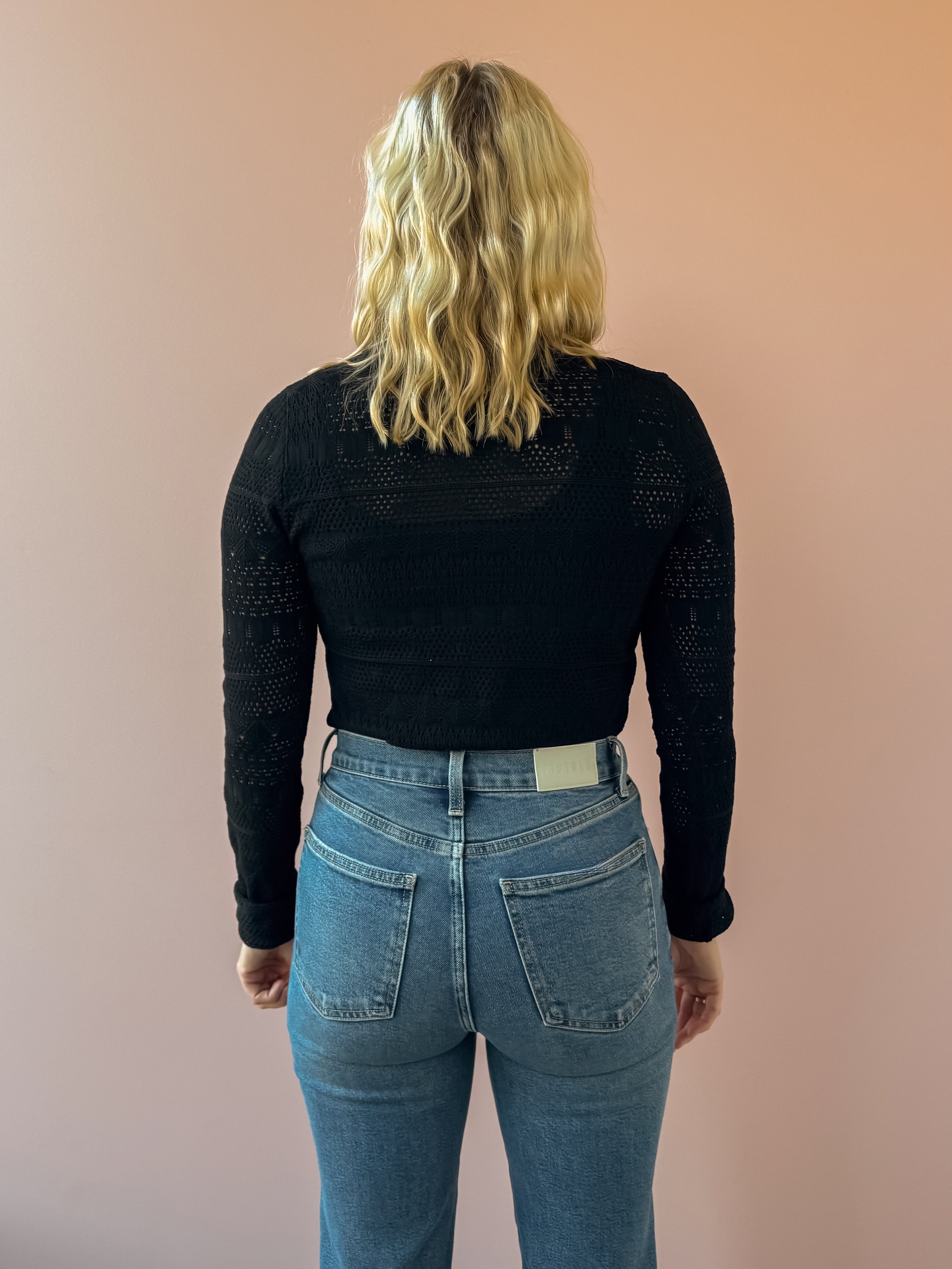 Z Supply Avery Black Sweater Top in black, back view.