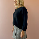 Z Supply Cloud Spun Shaped Crew Sweater in black, side view.