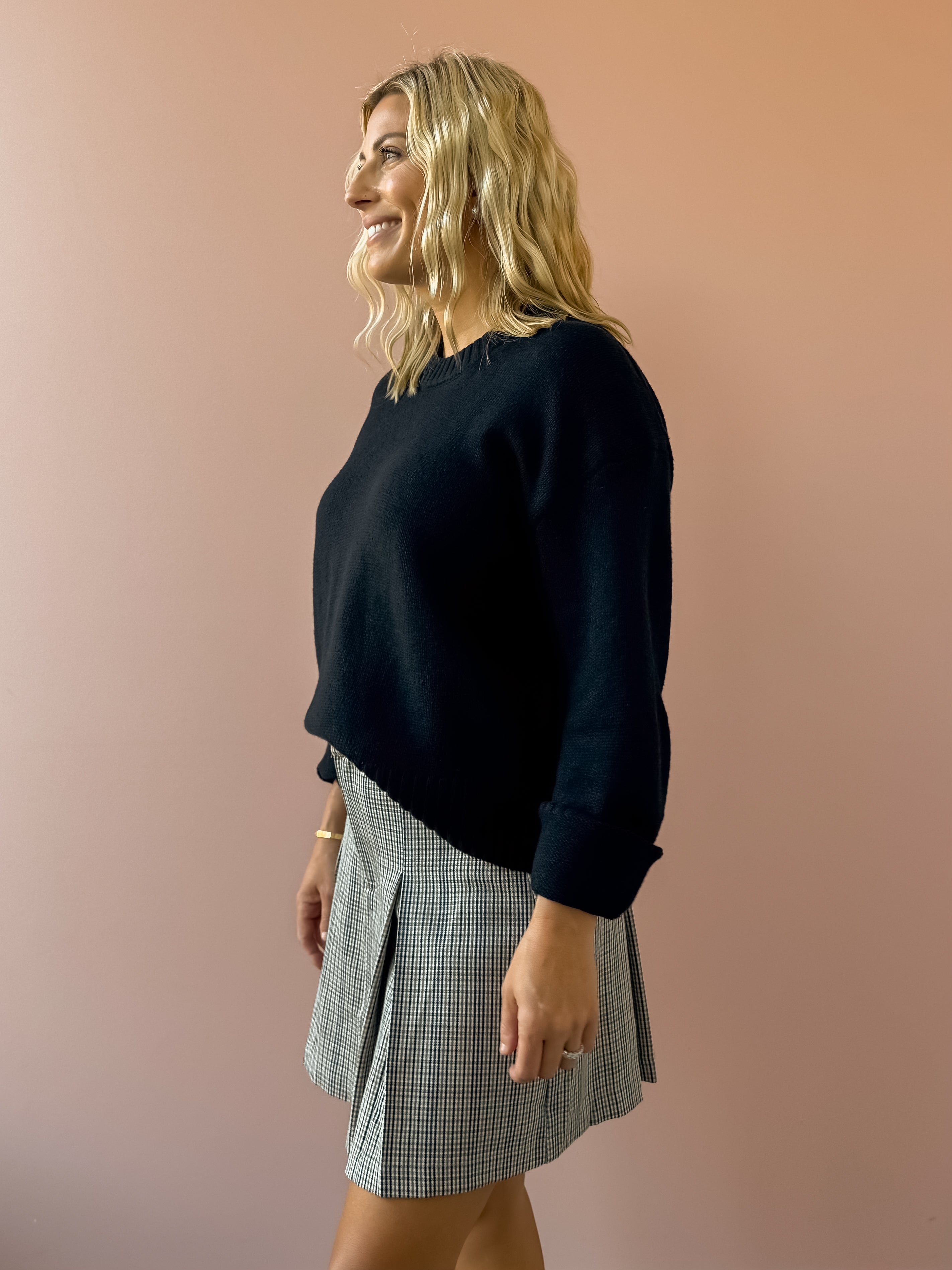 Z Supply Cloud Spun Shaped Crew Sweater in black, side view.