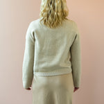 Zoe & Claire Naomi Dress Set in oatmeal, close-up back view.