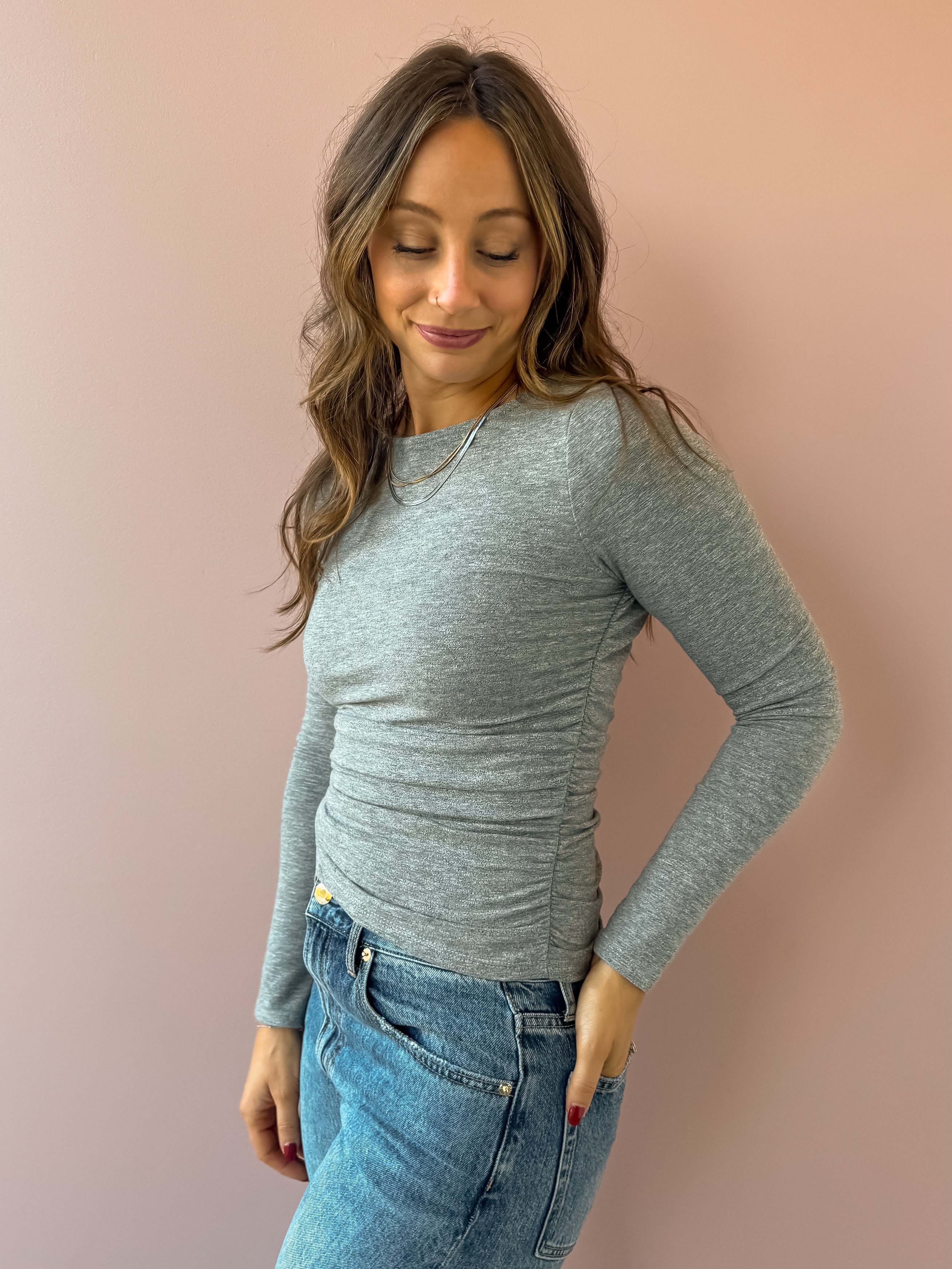 Sadie & Sage Page Turner Ruched Top in grey, close-up of side ruching.
