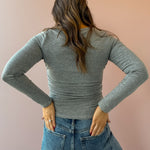 Sadie & Sage Page Turner Ruched Top in grey, back close-up.