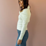 Sage The Label Free Bird Two Piece Sweater in ivory, side close-up.
