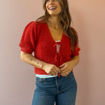 Saltwater Luxe Aeris Front Tie Sweater in red, front close-up.