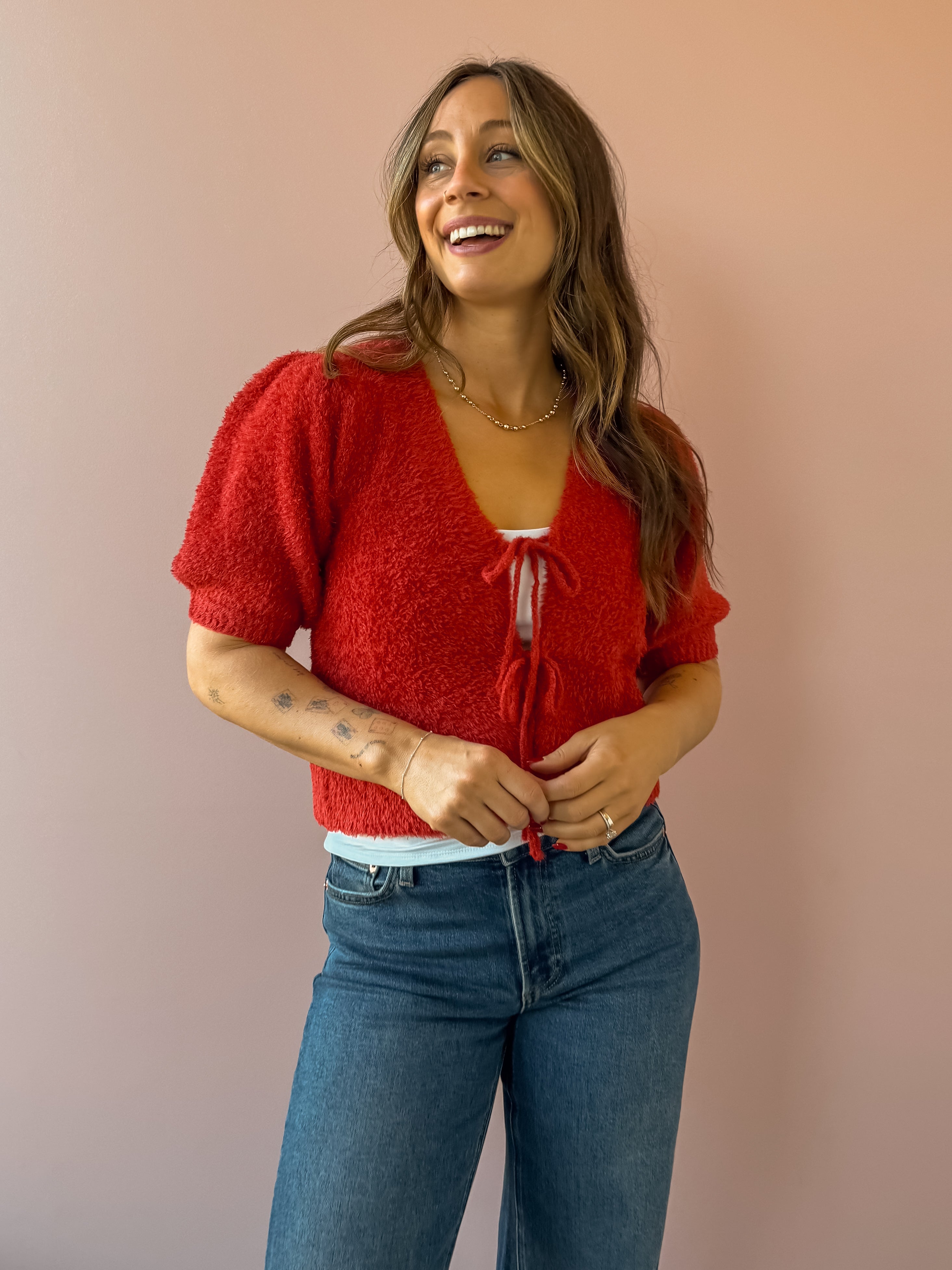 Saltwater Luxe Aeris Front Tie Sweater in red, front close-up.