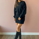 Sadie & Sage On A Stroll Mini Skirt in black, full-length front view.
