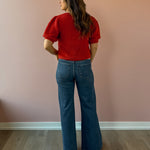 Saltwater Luxe Aeris Front Tie Sweater in red, back view.