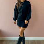 Sadie & Sage On A Stroll Mini Skirt in black, three-quarter view.