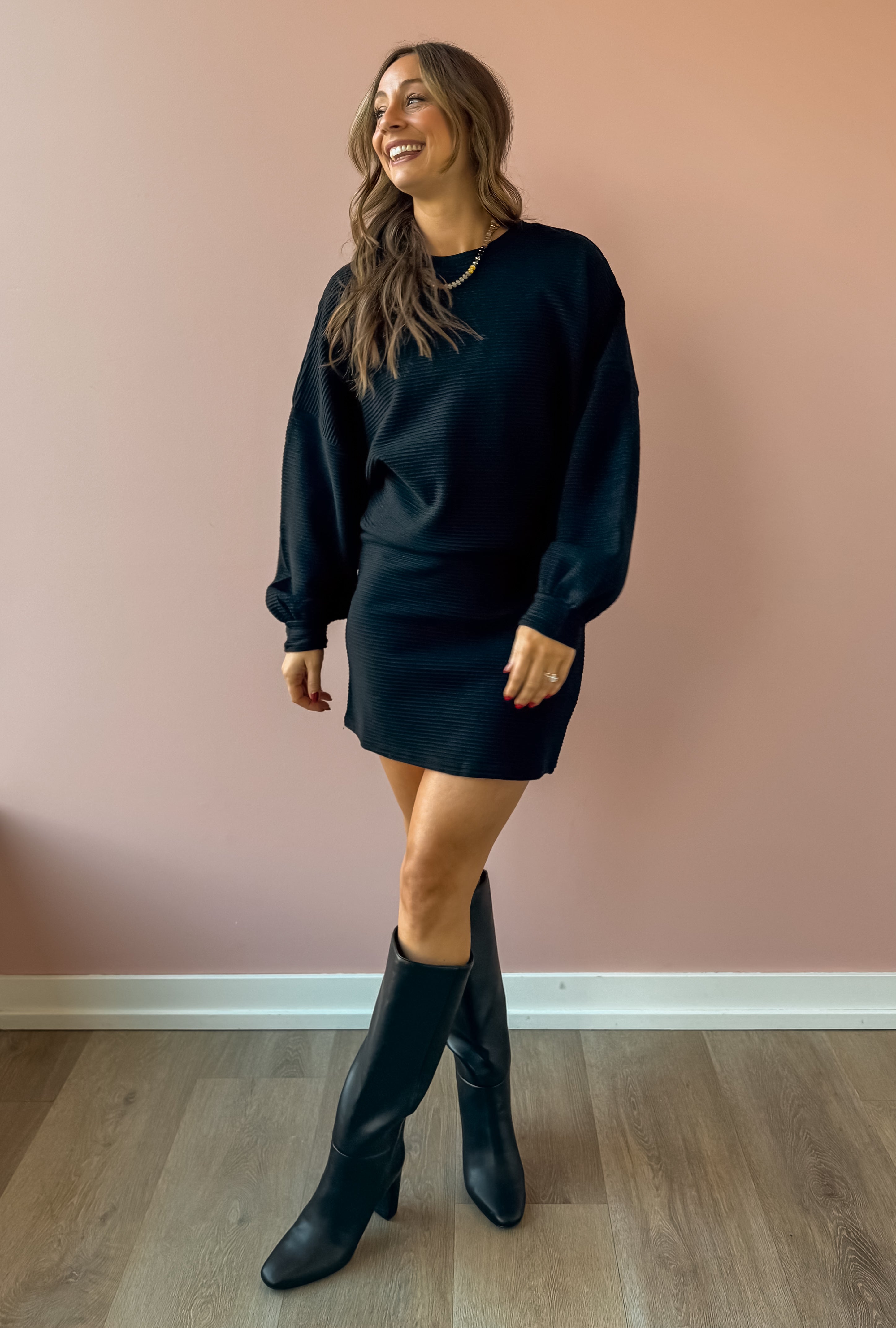 Sadie & Sage On A Stroll Mini Skirt in black, three-quarter view.