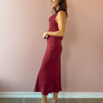Sadie & Sage Inner Circle Cowl Neck Midi Dress in red, side view.