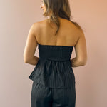 Sadie & Sage Gilded Evening Pinstripe Tube Top in black with silver pinstripes, back close-up.