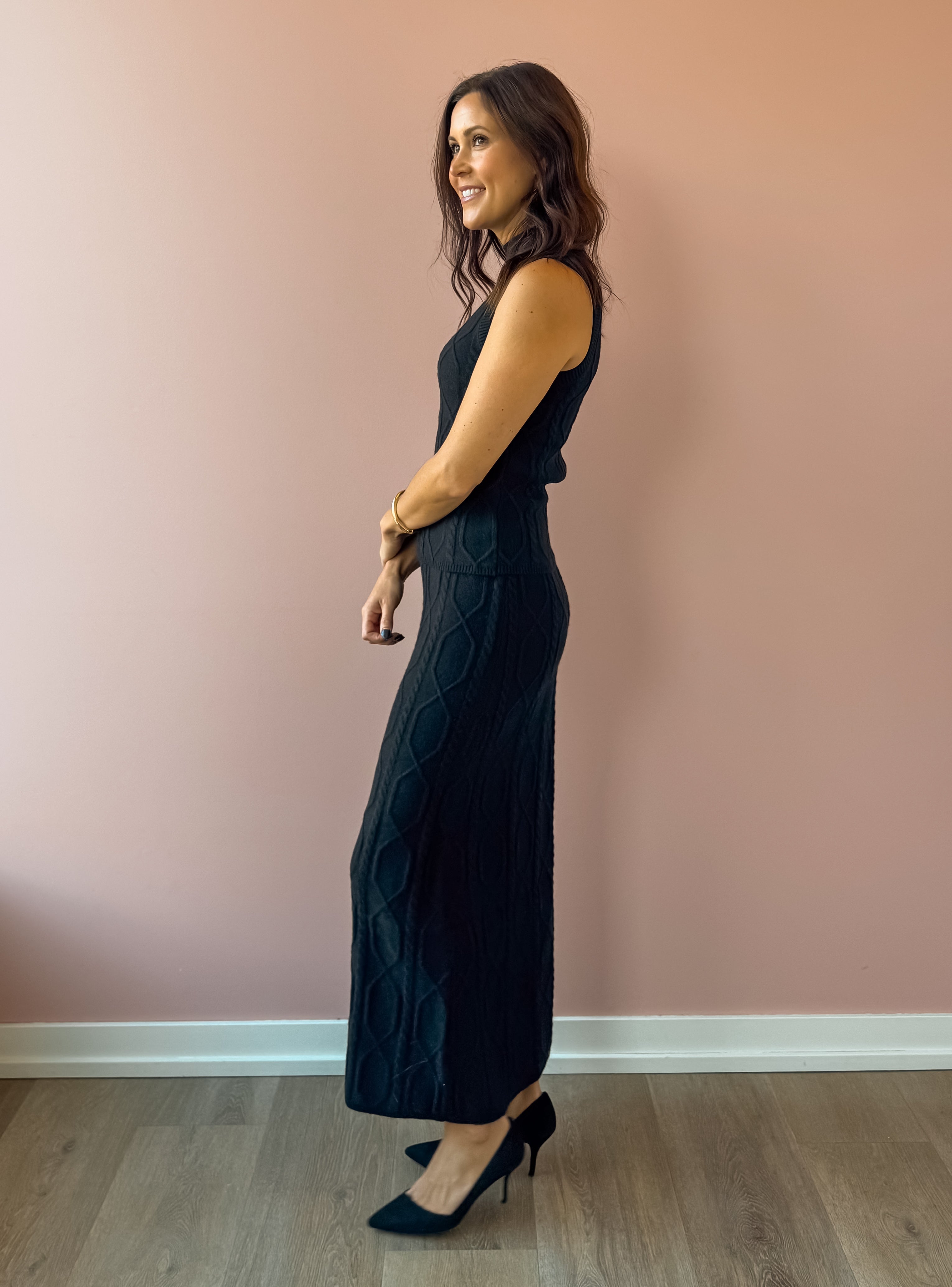 Sage The Label Tabitha Sweater Tank in black, side view.