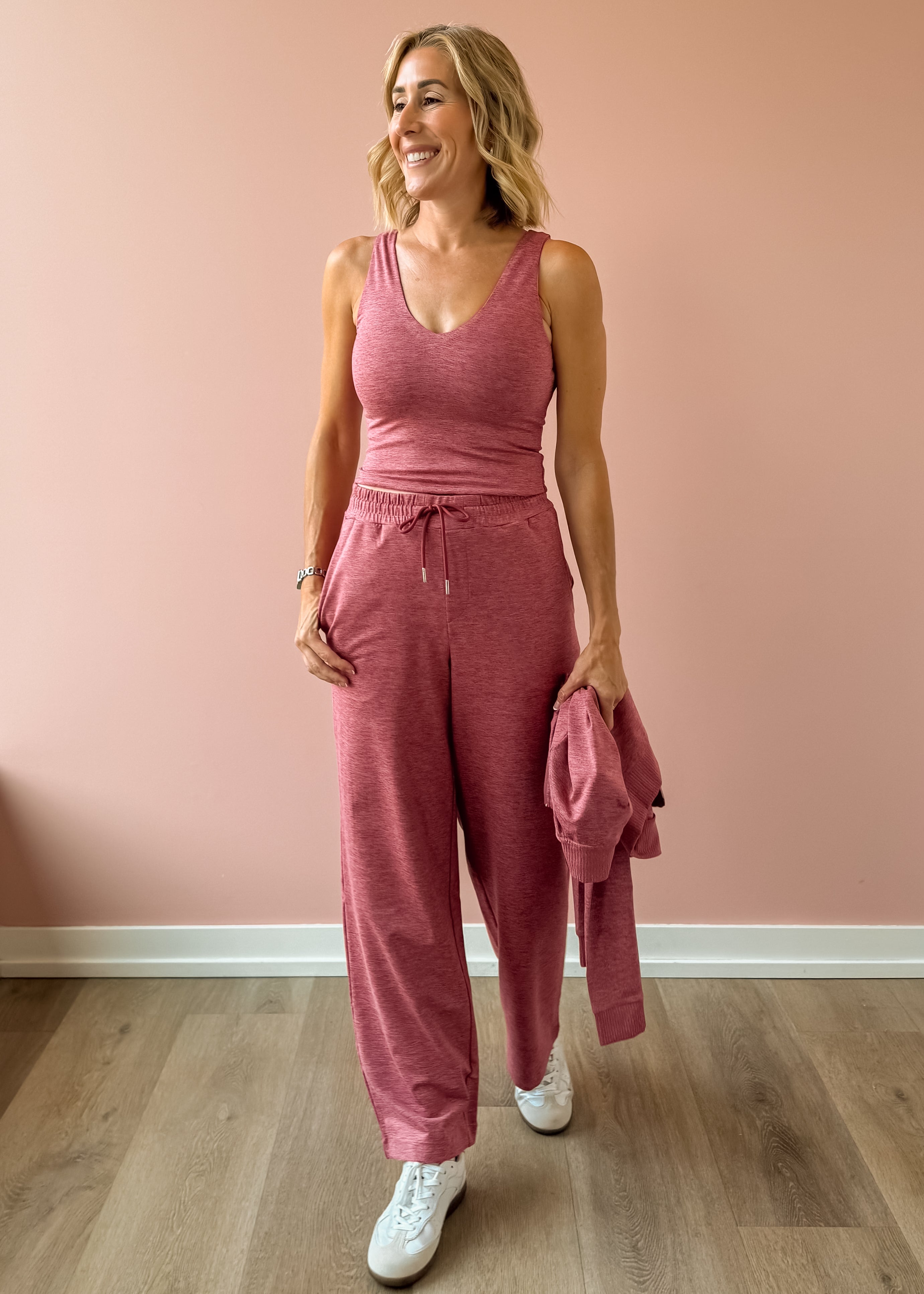 Varley Ruby Cropped Tank and Motion Easy Jogger 30 in pink, front view.