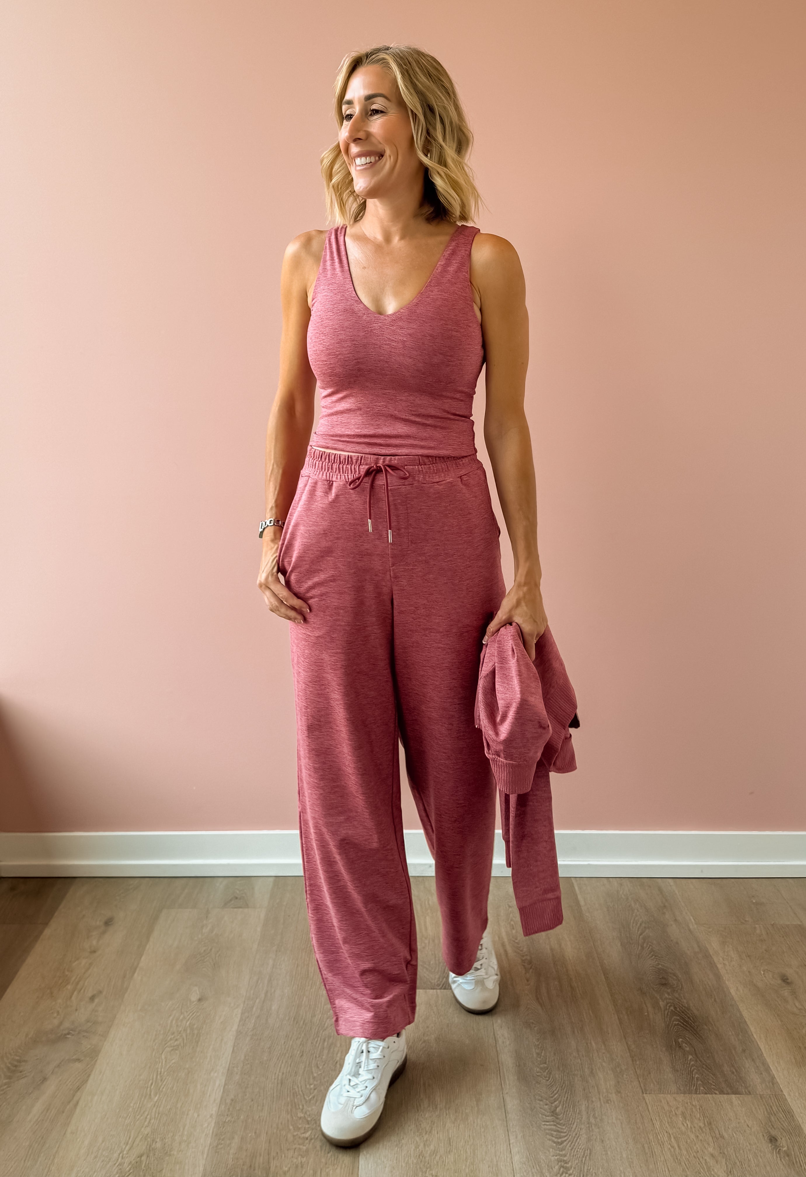 Varley Ruby Cropped Tank and Motion Easy Jogger 30 in pink, front view.