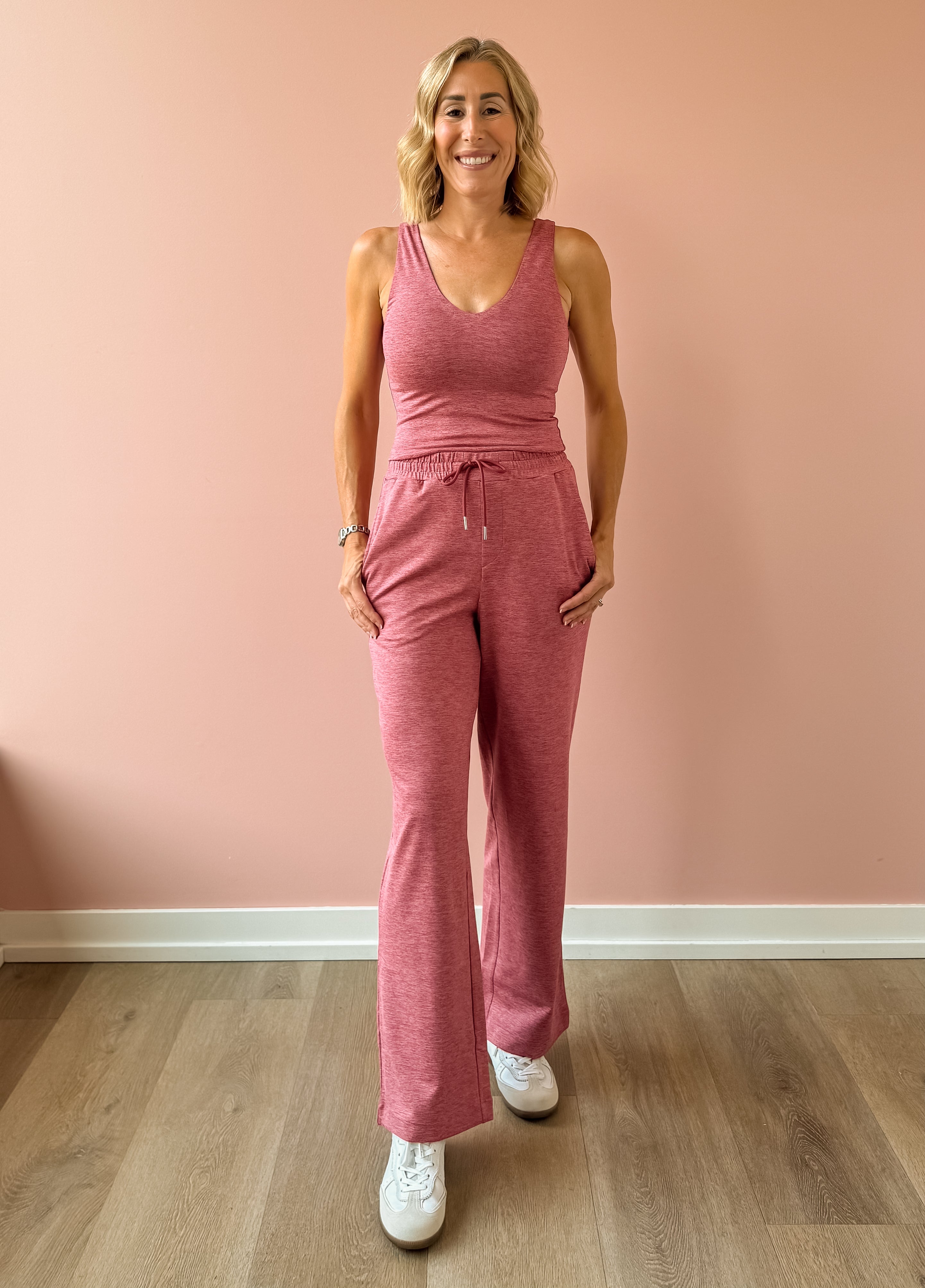 Varley Ruby Cropped Tank and Motion Easy Jogger 30 in pink, front view.