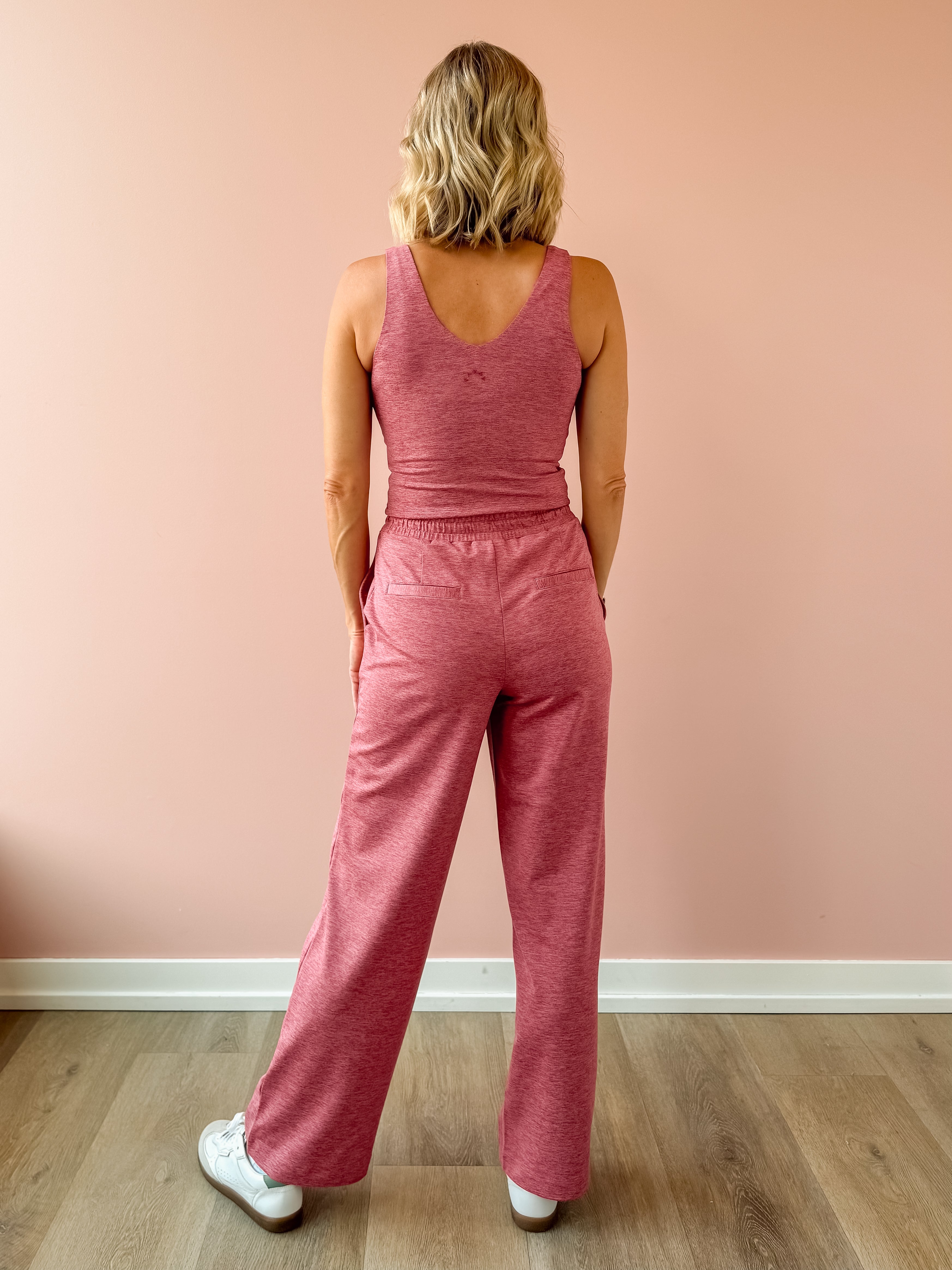 Varley Ruby Cropped Tank and Motion Easy Jogger 30 in pink, back view.