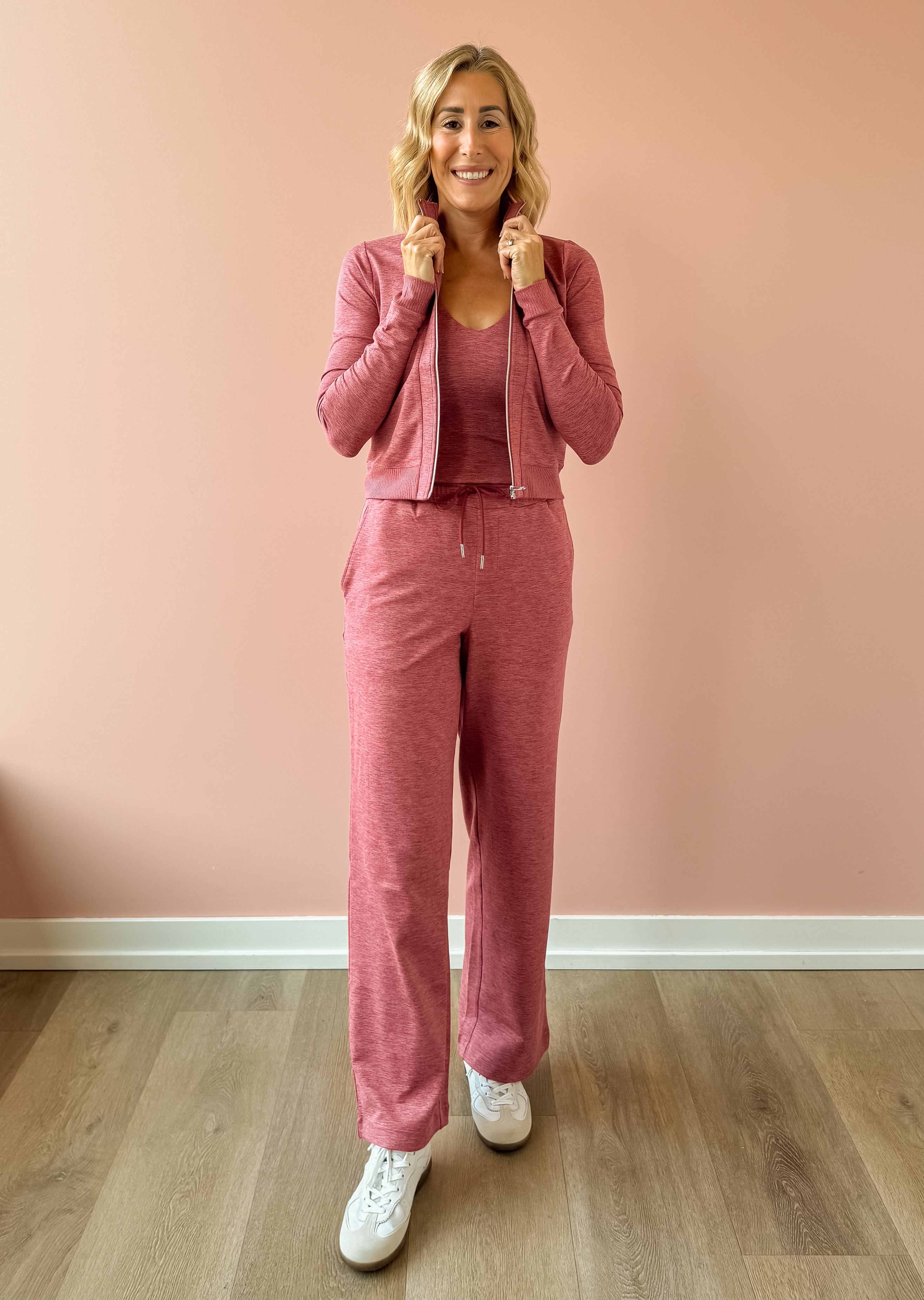 Varley Rufus Zip Through and Motion Easy Jogger 30 in pink, front view.