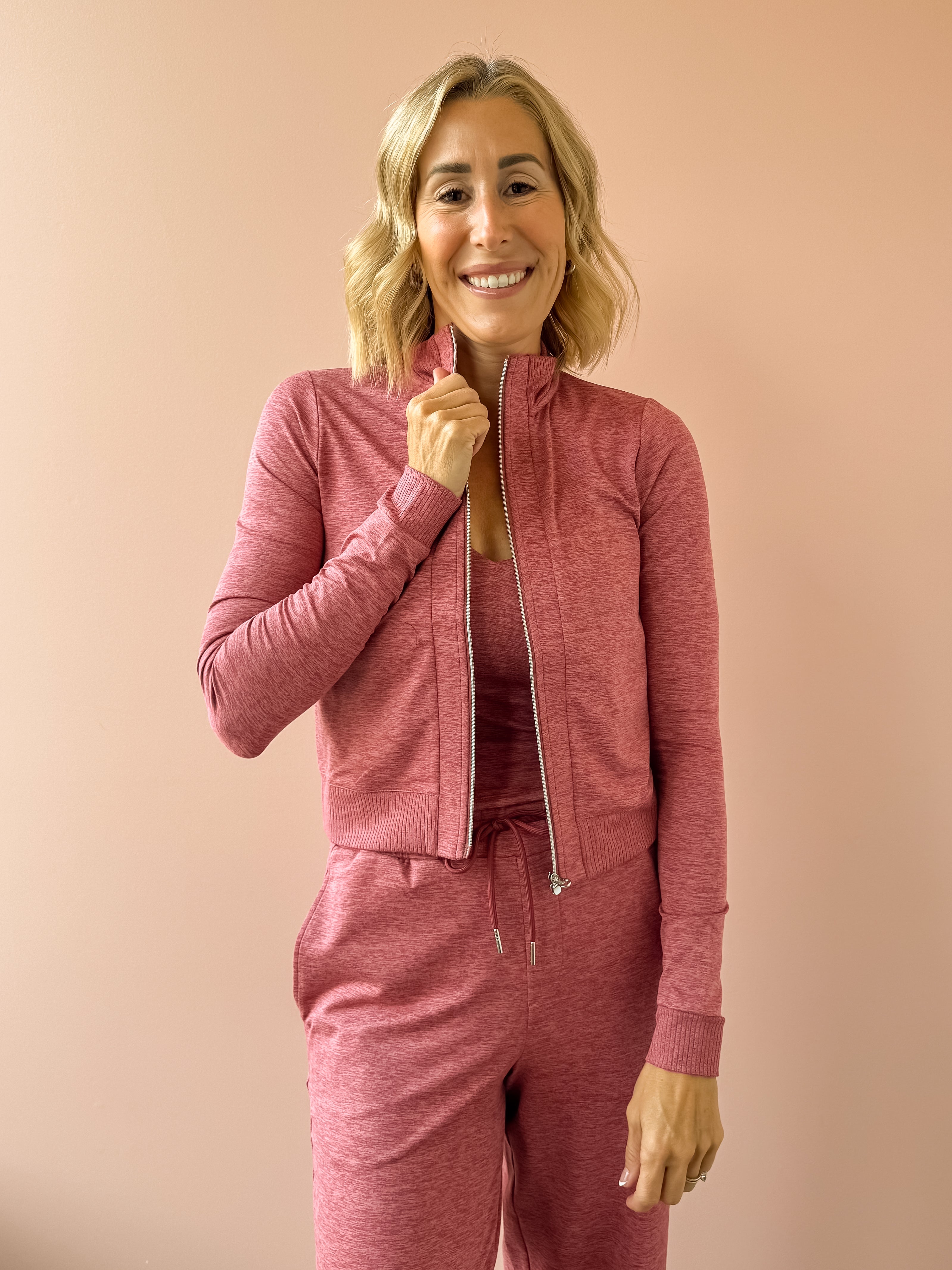 Varley Rufus Zip Through and Motion Easy Jogger 30 in pink, front close-up.