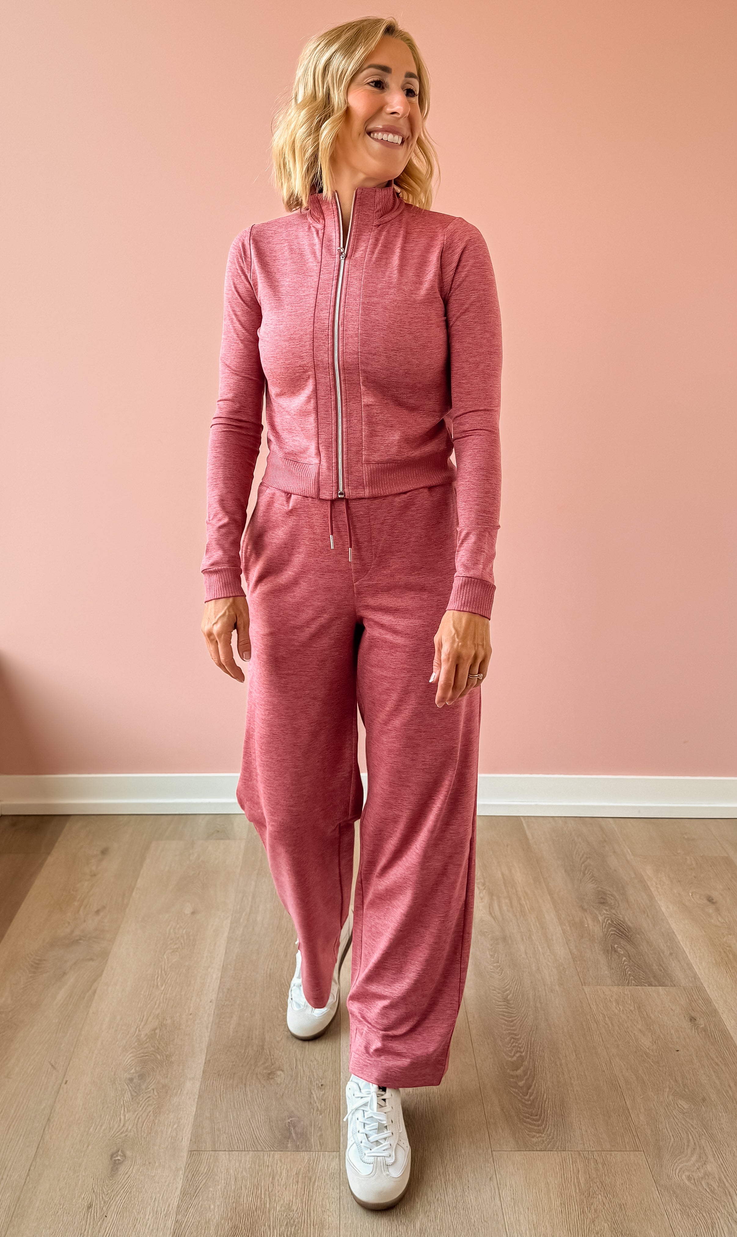 Varley Rufus Zip Through and Motion Easy Jogger 30 in pink, front view.