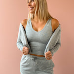 Varley Ruby Cropped Tank, Rufus Cropped Zip Through and Motion Easy Jogger 30 in grey, front close-up.
