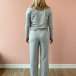 Varley Rufus Cropped Zip Through and Motion Easy Jogger 30 in grey, back view.