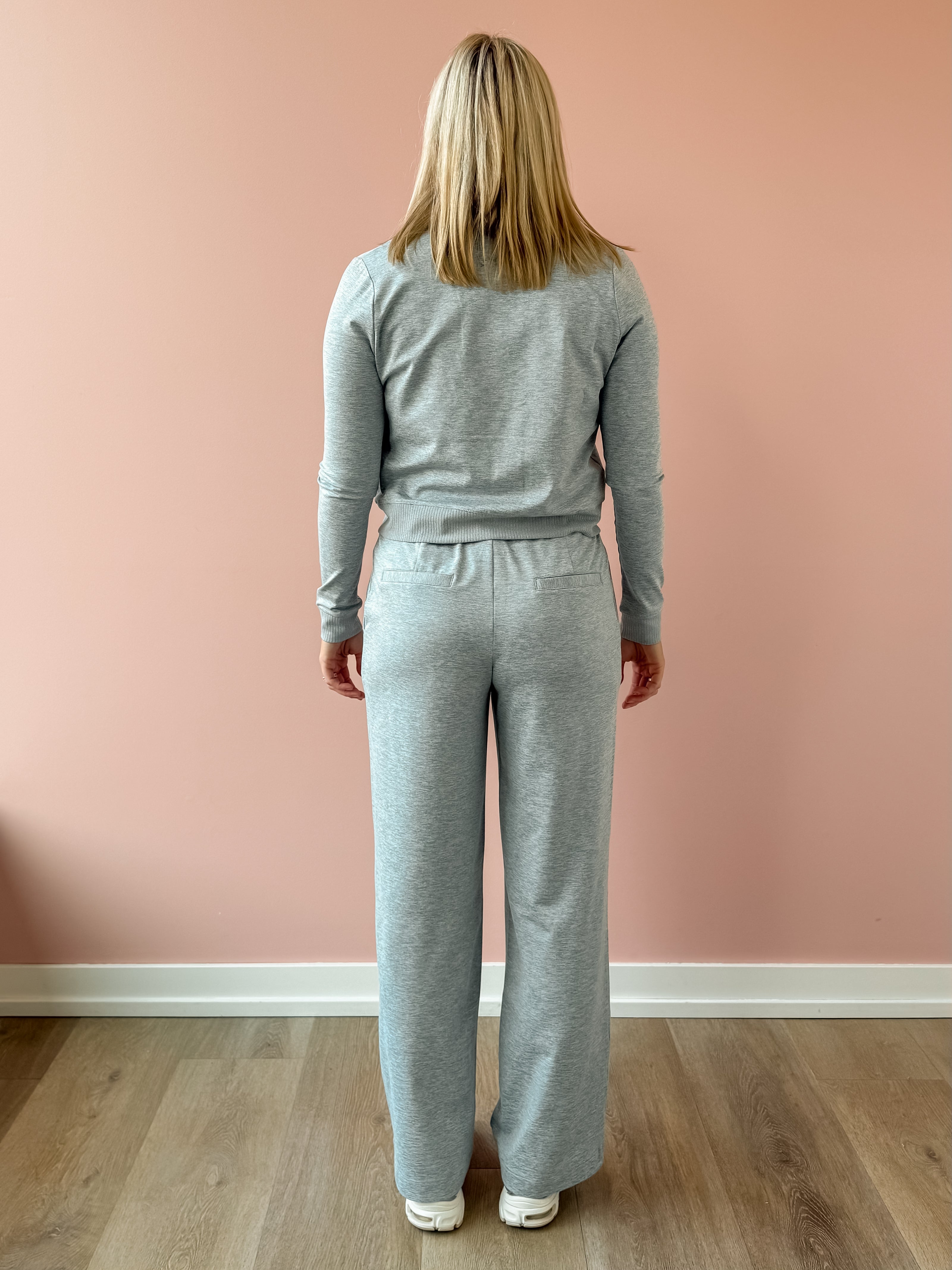 Varley Rufus Cropped Zip Through and Motion Easy Jogger 30 in grey, back view.