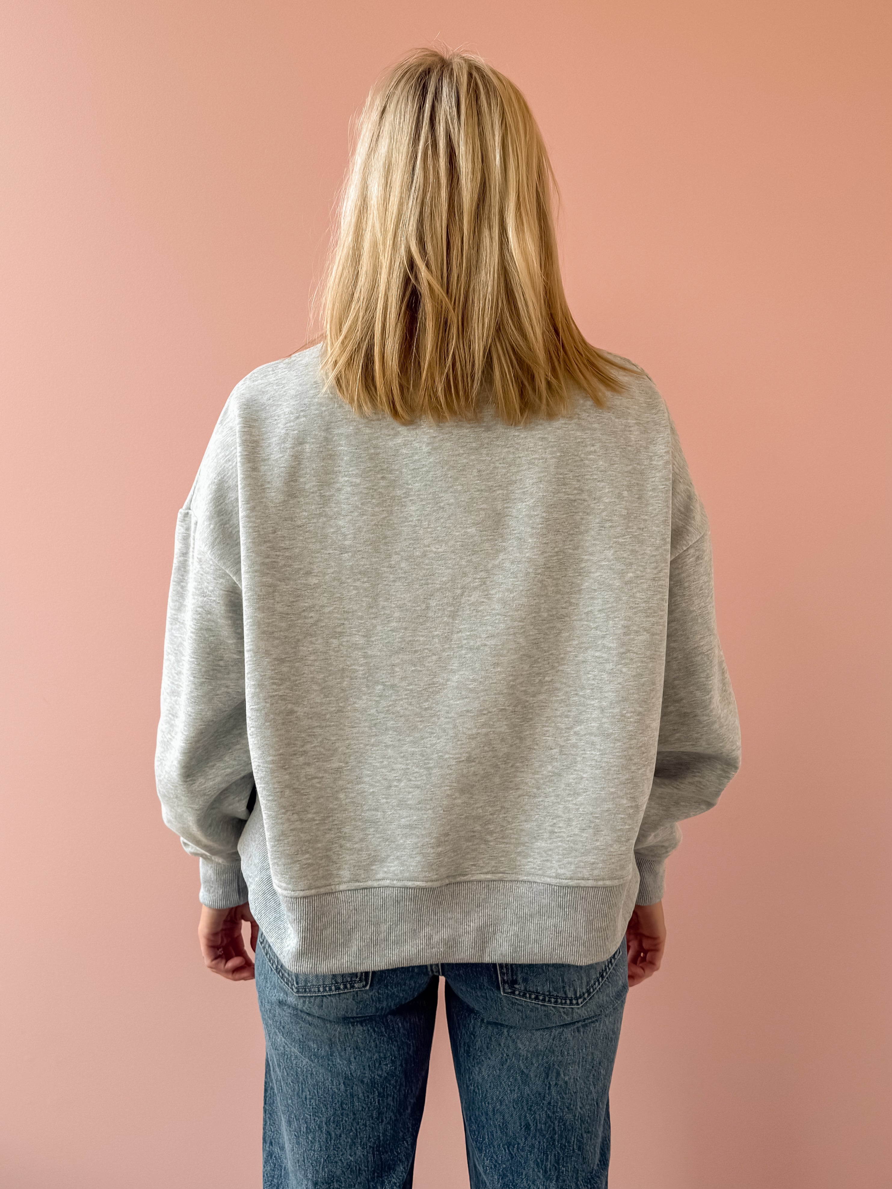 Glowie Apres Mock Neck Sweatshirt in grey, back close-up.