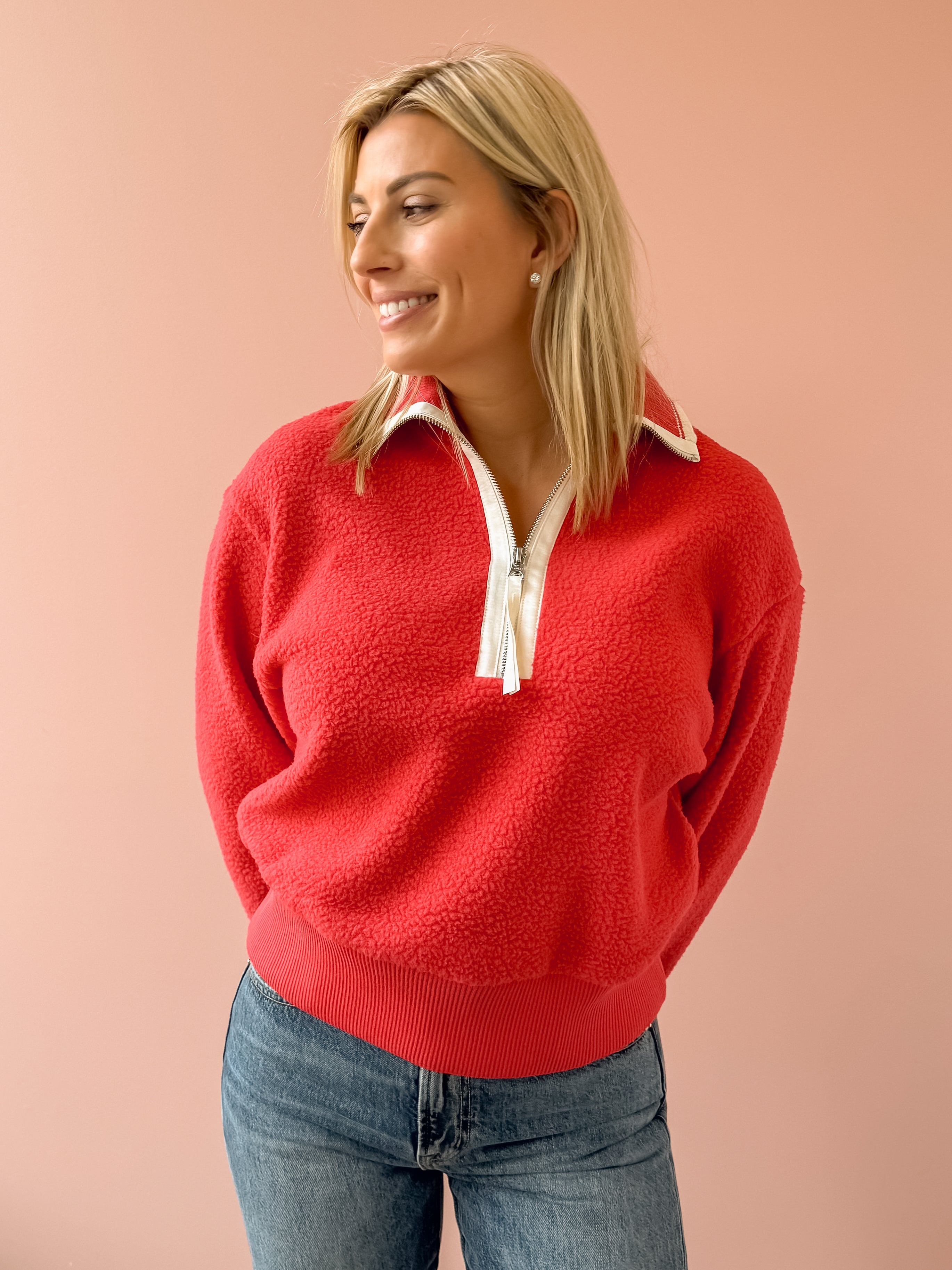 Varley Anika Half Zip Fleece in red, front close-up.