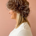 Common Knit Genevieve Brown Faux Fur Hat in brown, side view.