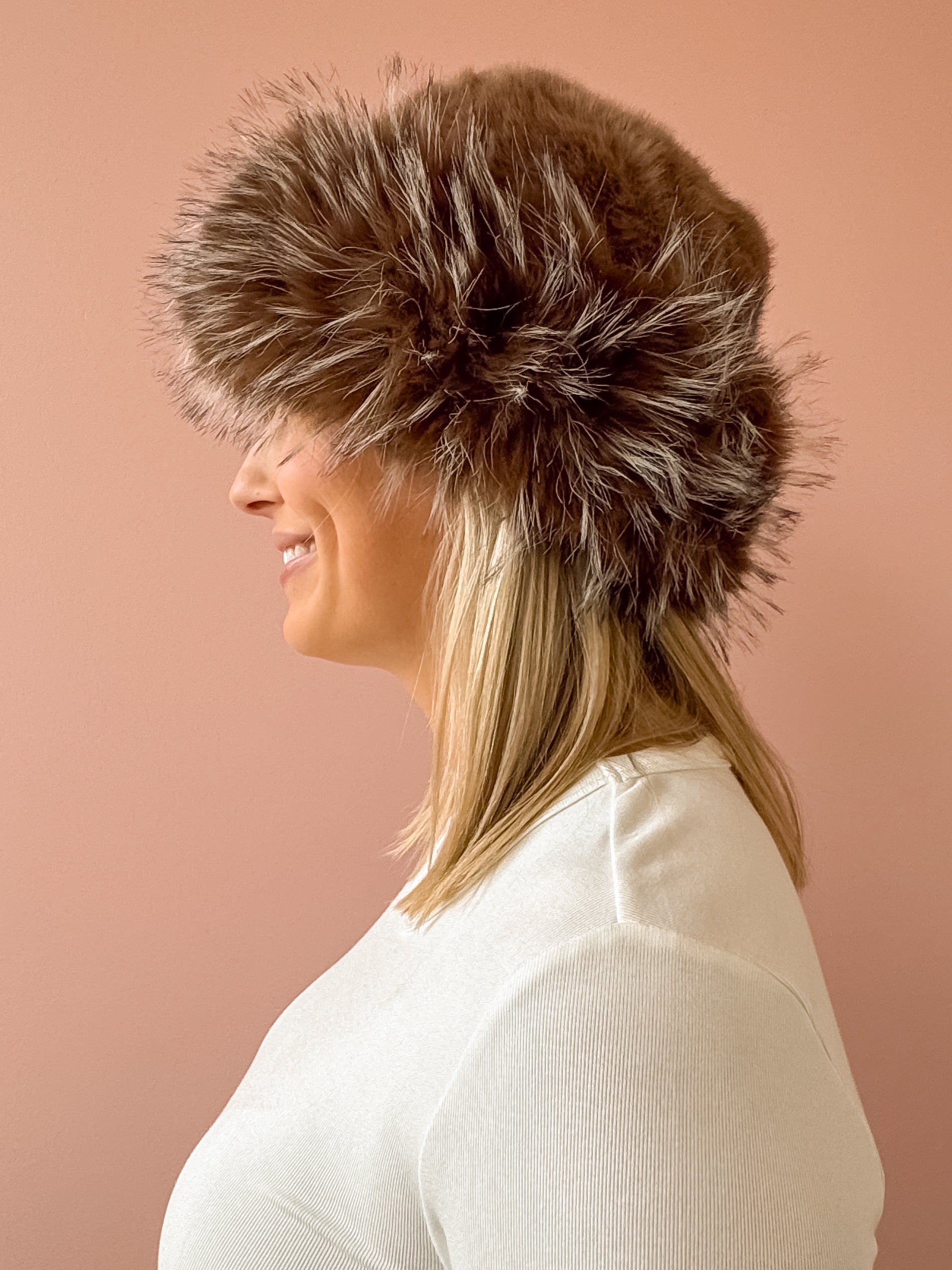 Common Knit Genevieve Brown Faux Fur Hat in brown, side view.