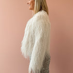 Sadie & Sage Angel Wings Fringe Jacket in ivory, side close-up.