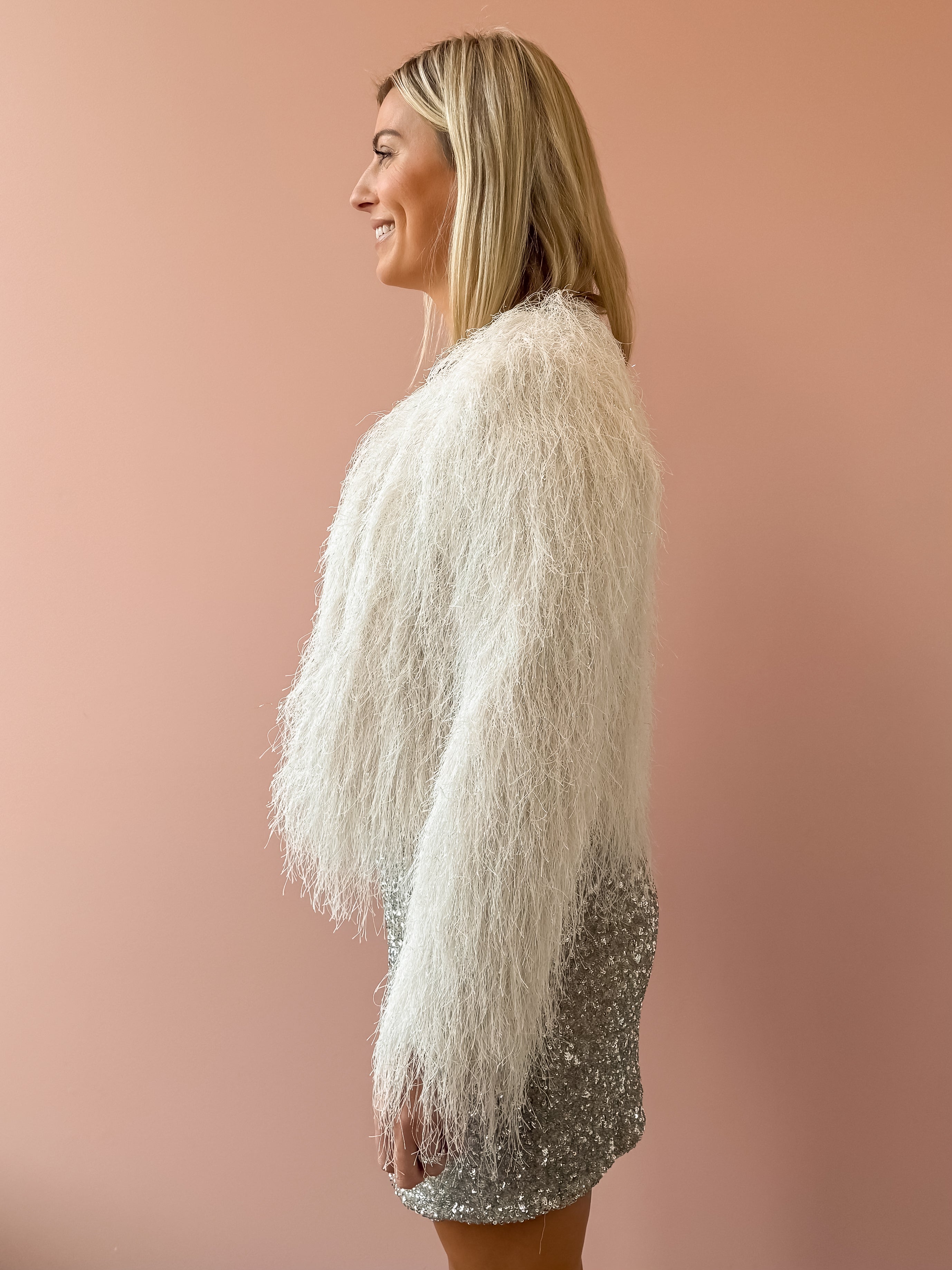 Sadie & Sage Angel Wings Fringe Jacket in ivory, side close-up.