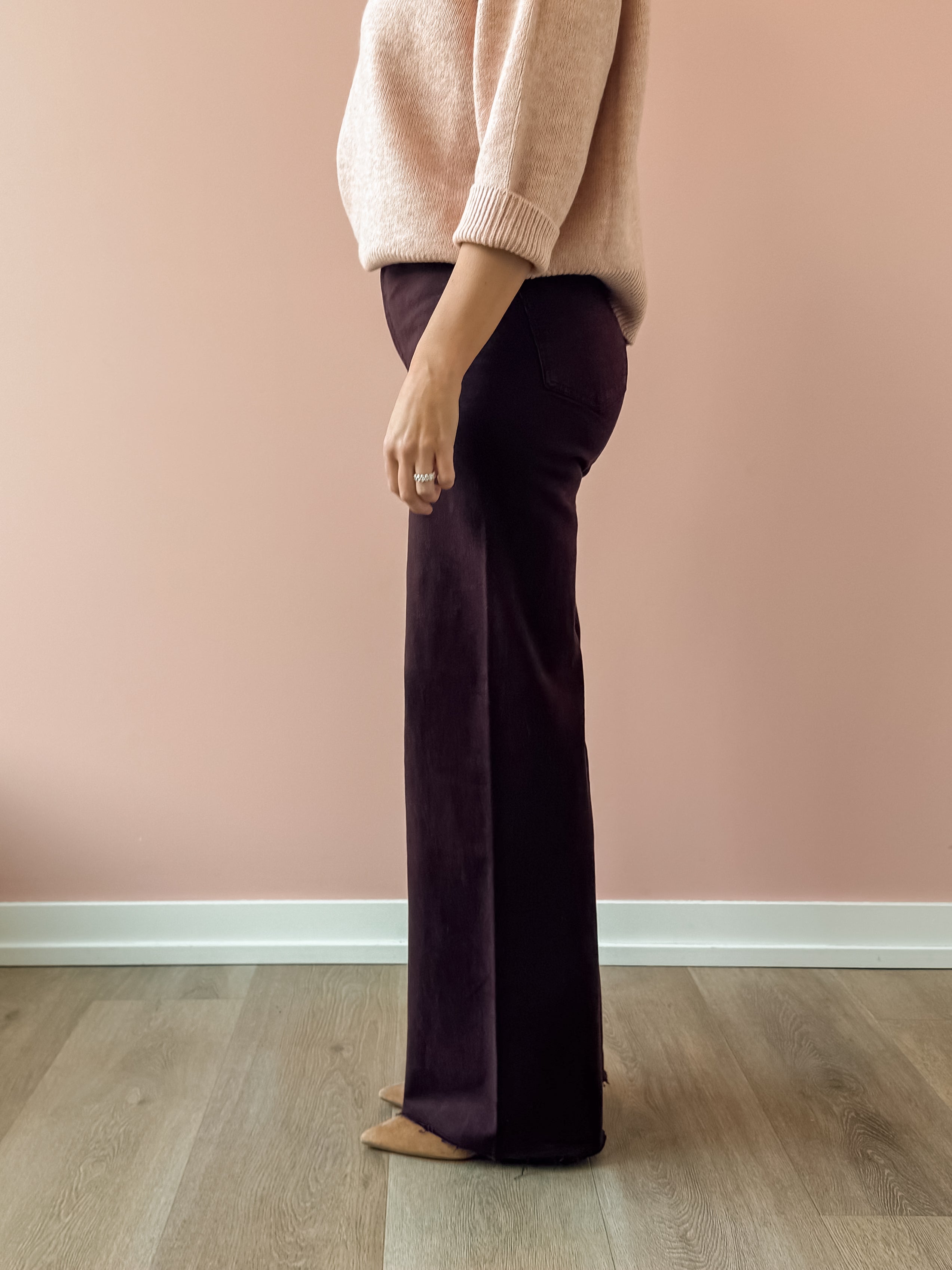Pistola Penny High Rise Wide Leg Jean in claret, side close-up of the leg.