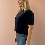 Dear John Maddox Short Sleeve Top in black, side close-up.